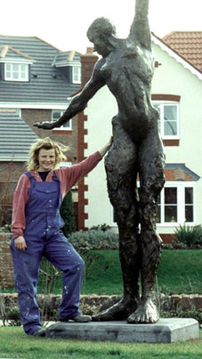 Carol Peace with sculpture in situ